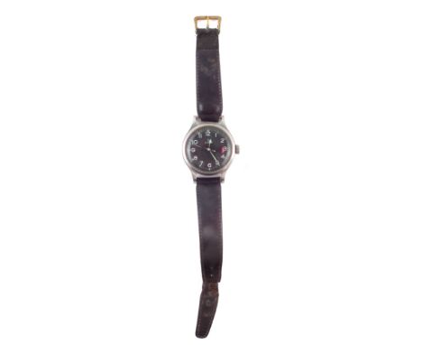 Omega military manual wind wrist watch, black face with Arabic numerals, luminous hand and baton markers, engraved with 'A.M'
