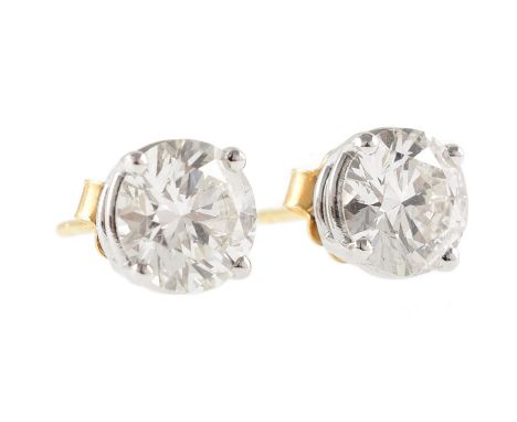 Pair of diamond solitaire 18ct gold stud earrings , the two round brilliant cut diamonds 4-claw set to 18ct white gold, each 