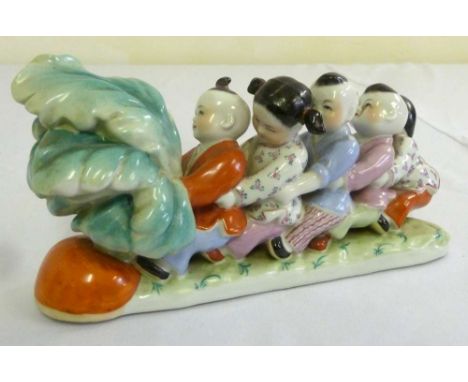 Chinese ceramic figural group of children at play