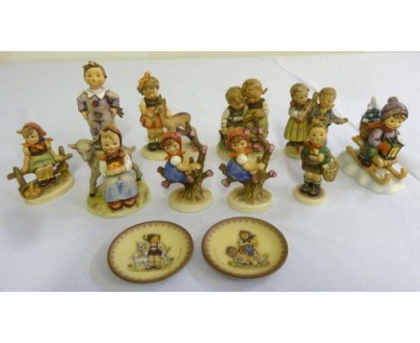 A quantity of Goebel figurines of children and two limited edition plates  (12)