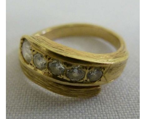 9ct gold ring set with five stones