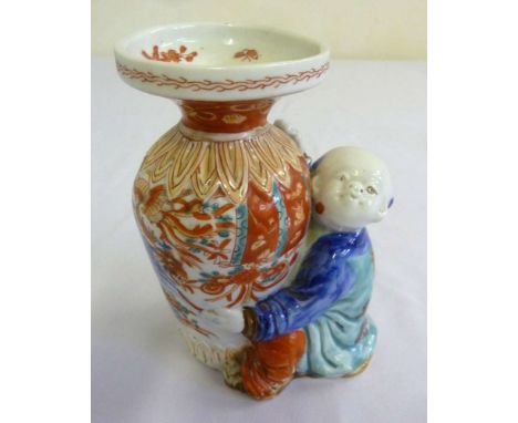 Chinese ceramic vase with applied figurine