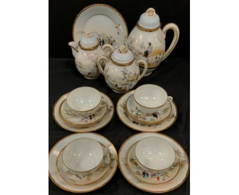 A Japanese egg shell tea service for four including; tea pot, milk jug, sugar pot, four tea cups and saucers; etc 