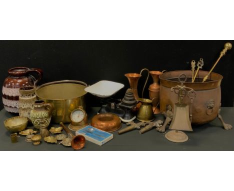 Copper and brass - a 19th century large brass jam pan, 33cm dia, copper ewers, fire sides, copper parade trumpet, cast iron w