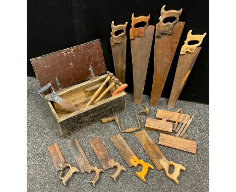 A pine tool chest, with carpentry tools - Spear and Jackson hand-saws, tenon saws, rebate planes, etc. 