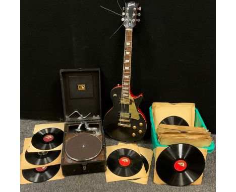 Music and musical instruments - A Gibson Les Paul replica guitar;  His Master’s Voice gramophone record player, box of record