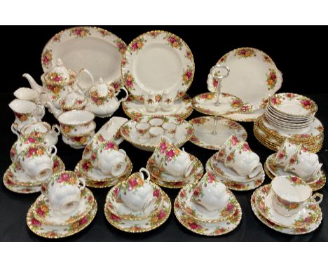 A Royal Albert ‘Old Country House roses’ part table service for eight including; four dinner plates, five medium plates, five