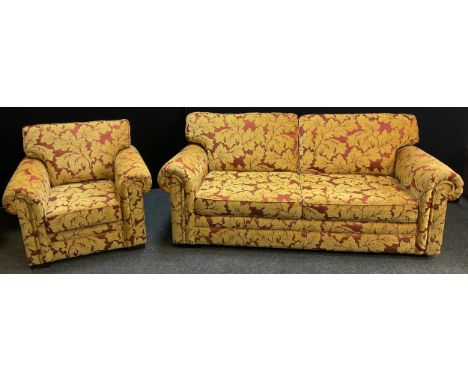 A three seat scroll arm sofa, and conforming armchair, the sofa measuring 90cm high (45cm at seat) x 215cm x 103cm, (2). 