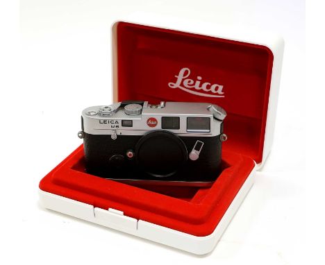 Leica M6 Camera Body no.1906695, in display box with Warrantee Card, Instructions and other paperwork, in card outer with cor