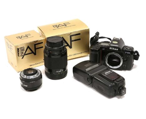 Nikon F801 Camera in soft case together with Nikkor F lenses: f1.8 50mm and f4-5.6 70-210mm (both in original boxes) with fla