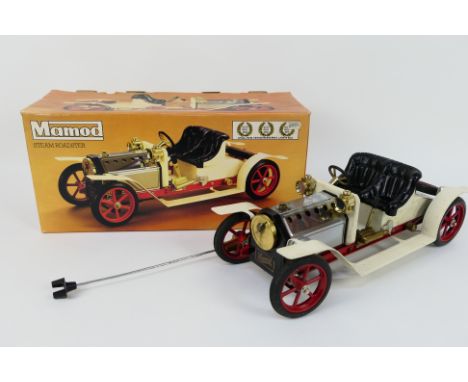 Mamod - A boxed Mamod SA1 Steam Roadster. The live steam engine shows signs of use, , otherwise appears to be in Excellent co