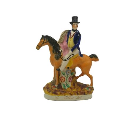 A Staffordshire portrait figure of Sir Robert Peel on horseback. Titled Sir Robert Peel in gilt script. Circa 1850      size 