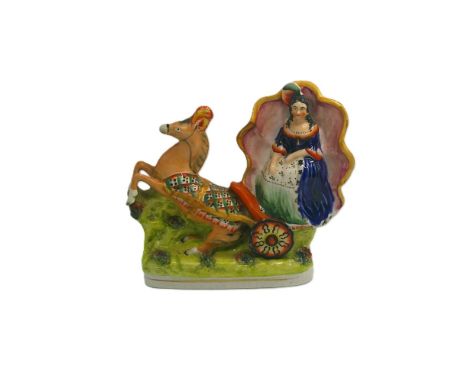 A rare Staffordshire portrait figure of Mlle Alboni in the role of Cinderella. Circa 1848    size 22.5cm high 25cm wide Condi