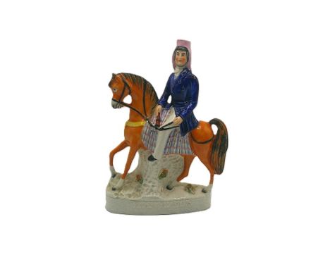 A Staffordshire portrait figure of Sir Henry Havelock on horseback. Titled   Havelock in gilt raised capitals Circa 1857    s