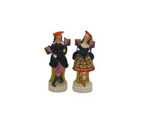 A rare pair of Staffordshire portrait figures of dancers performing the &lsquo;Flag Polka&rsquo; Circa 1850 size 24.5cm high 