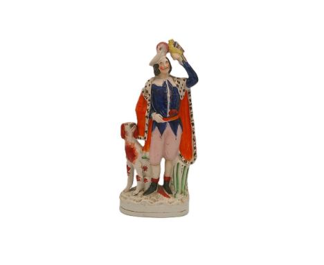 A Staffordshire portrait figure of a Huntsman and his dog, his left arm raised holding a bird.  Circa 1850. Size 37.5cm high 