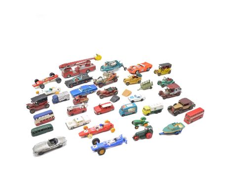 Thirty-two loose play-worn die-cast model vehicles, including Corgi First Batmobile, Corgi 'Chitty Chitty Bang Bang' motorcar