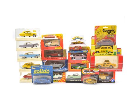 Twenty-two die-cast model vehicles, including Solido ref 149 Renault 40 CV; Majorette 'Bassett's Jelly Babies' taxi; Solido B