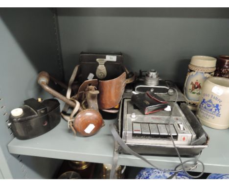 A selection of cameras including Kodac and Comet  and a selection of tools including Cowley level