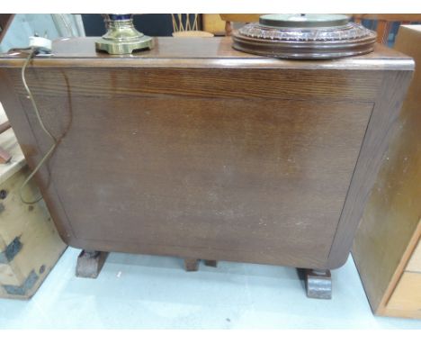 A mid 20th Century oak gate leg table 