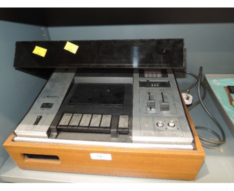 A vintage Sharp automatic cassette player