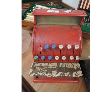 A vintage child's toy till by St Michael