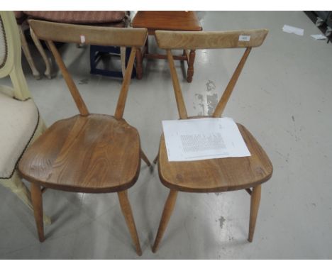 A pair of vintage Ercol style kitchen chairs stamped design number 884892APPROX 17.5"