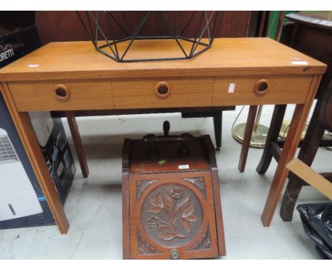 A vintage side table of small proportions, teak finish