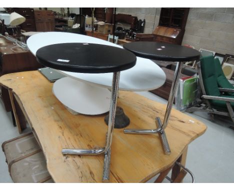 Two vintage chrome and black side tablesGOOD CONDITION ON TOPS FEW LITTLE SCRATCHES. METAL BASE ARE STARTING TO RUST