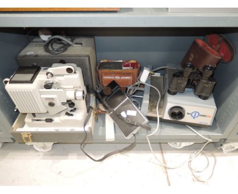 A selection of vintage photographic and film related accessories and equipment including Eumig