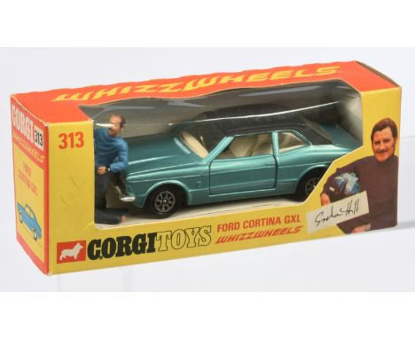 Corgi 313 Ford Cortina GXL "Graham Hill", metallic aqua body, black roof and base, ivory interior, Whizzwheels, with Graham H