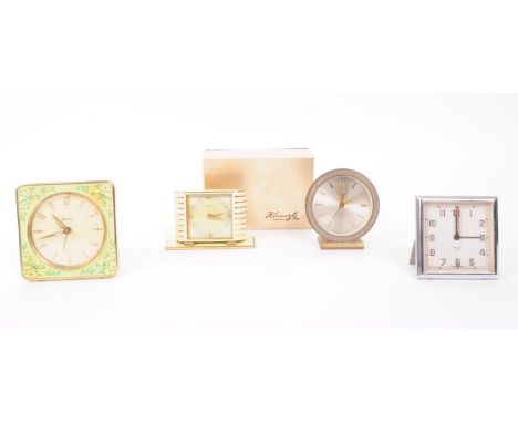 A collection of four vintage 20th century mantel clocks, comprised of a Kienzle art deco style clock, boxed, a Smiths clock, 