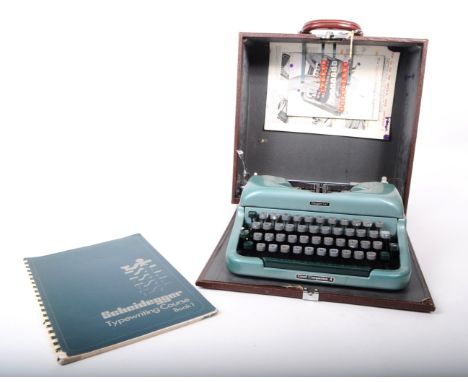 Imperial, England - Good Companion 4 - A mid century circa 1960s typewriter. Has a metal body in a light sea foam green colou