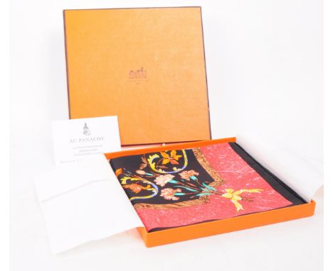 Hermes - Paris - Late 20th century boxed silk scarf. Featuring a central floral design on a black background and a red border