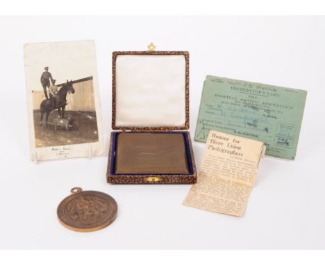 Two early 20th century bronze medals, comprised of an Amateur Photographer and Cinematographer square medal and a Henley Sail