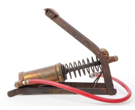 Kismet Baby - A vintage 20th century manual foot pump. Cast iron construction with barrel cylinder, red hose with tyre valve 