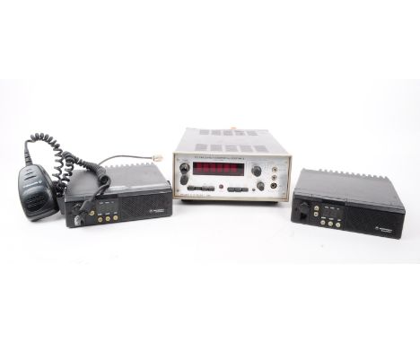 A collection of three vintage pieces of electrical equipment, comprised of a Malden Electronics Ltd Frequency Counter No. 100