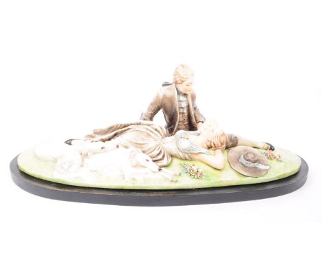 Capodimonte (Guido Cacciapouoti) - Italy 1892 - 1953 large ceramic figurine sculpture of a courting couple and two dogs. Sign
