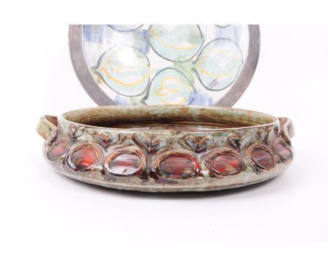 Two mid century studio art pottery centre piece / fruit bowls. Earthenware ceramic with twin handles, glazed finish with red 