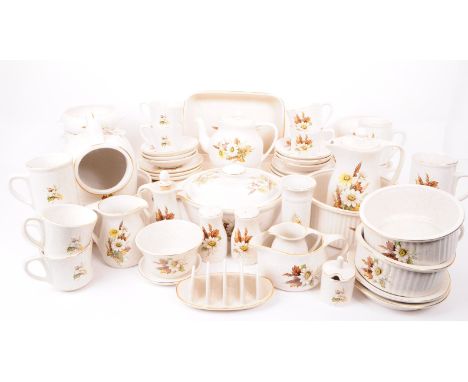A large collection of late 20th century Kernewek, Cornwall pottery dinner service pieces, including teapot, tea cups, saucers