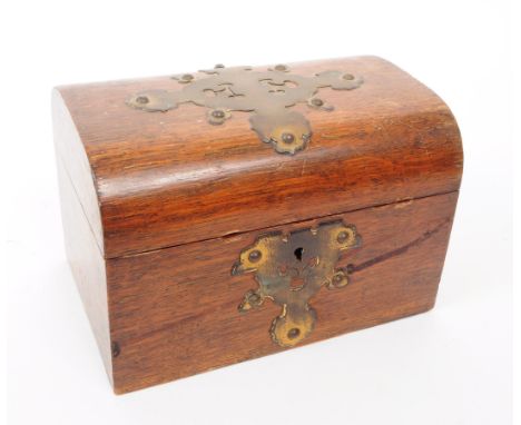A 19th century Victorian gothic domed top tea caddy. Having brass mounts with hinged lid two compartments to interior with li
