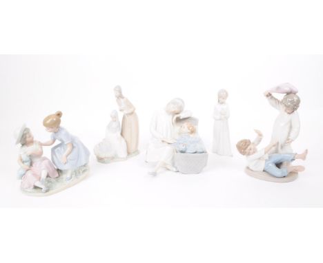 Lladro - Nao - Five late 20th century porcelain figures. Comprised of a mother and a child in a cradle, two boys pillow fight