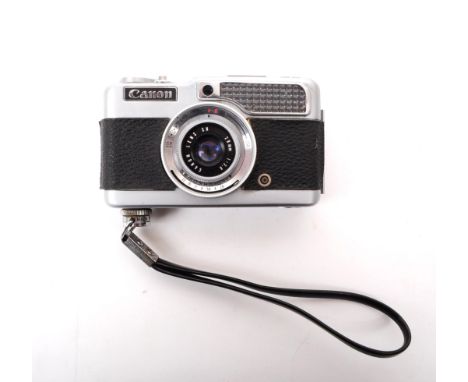 Canon - A vintage mid 20th century circa 1960s Canon Demi half frame 35mm viewfinder camera. The camera having 28mm F2.8 lens
