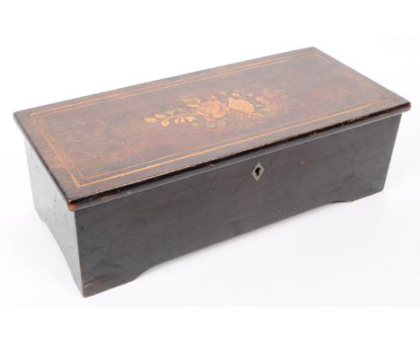 A late 19th century wooden music box with an inlaid hinged lid opening to reveal a 21cm brass cylinder accompanied by a 70 to