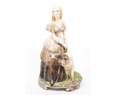 Guido Cacciaputi - Italy (1892 - 1953) - Ceramic sculpture of a lady walking a Borzoi dog in the manner of Lenci. Signed to t