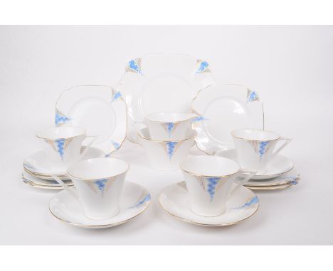 Art Deco porcelain china tea service set. Two persons service with cups, saucers, side plates (trios), milk jug and sugar bow