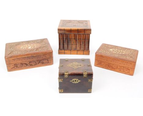 A collection of four 20th century carved wooden trinket / jewllery boxes. Including a small brass banded wooden money box, al