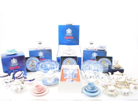 A collection of late 20th century miniature china tea service pieces, including examples by Spode (boxed), Wedgwood and Coalp