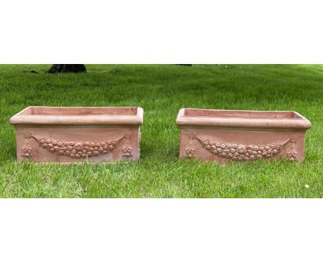GARDEN PLANTERS, a pair, weathered Tuscan terracotta of trough form with garland swag decoration, 83cm x 41cm x 35cm H. (2) 
