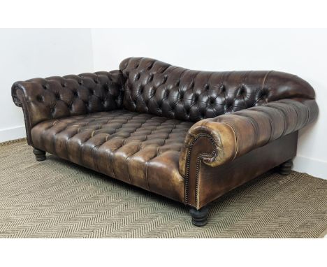 SOFA, deep seated in buttoned brown leather, 74cm H x 205cm W x 107cm D. 